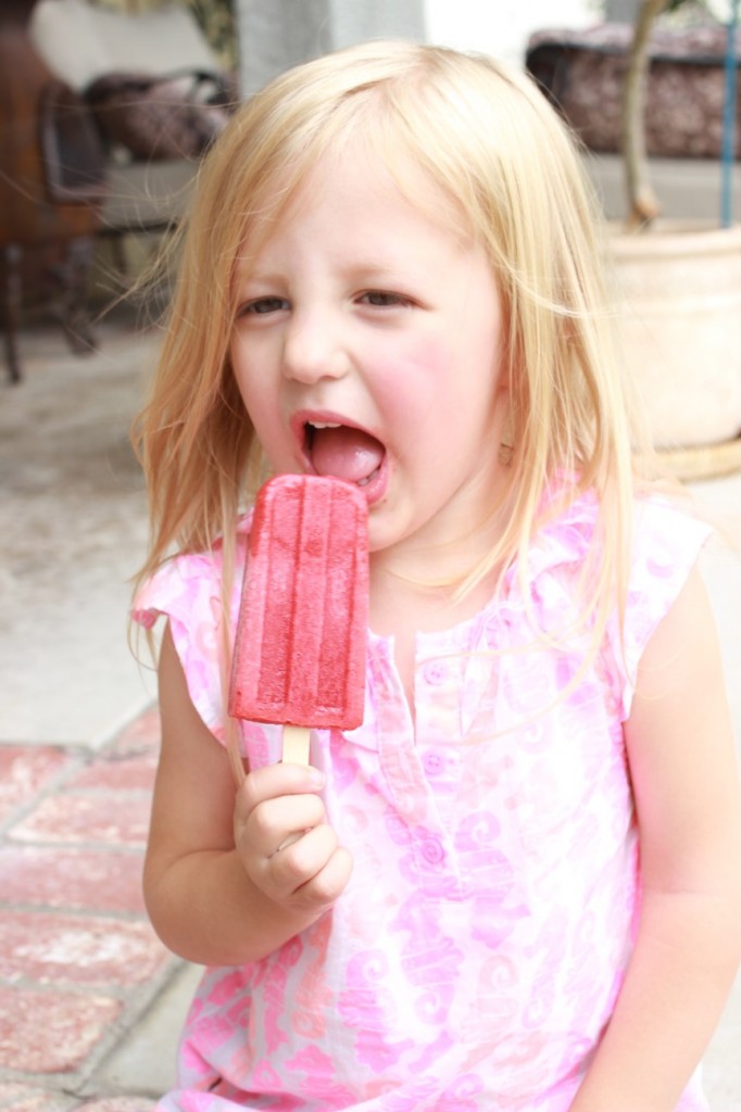 s_eating_strawberry_limeade_popsicle